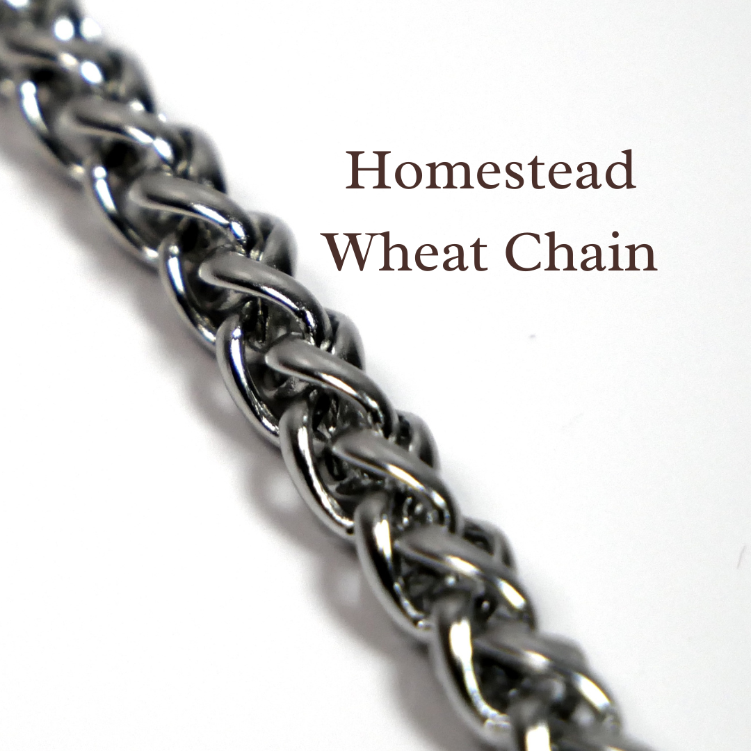 Close-up of a Homestead Wheat Chain on a white background. Devotion Clasp Collar. Trad wife. Handcrafted biblical womanhood jewelry USA. Traditional wife faith necklace.